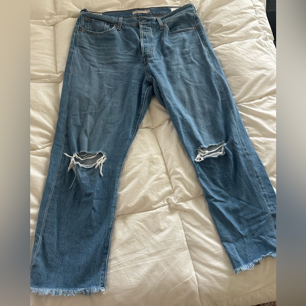 Women’s Levi’s high waisted wedgie straight jeans with distressing.